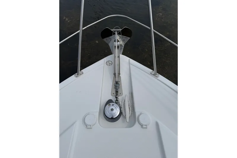 Slide: The Image of Bow of 2003 Carver 366 Motor Yacht with anchor and railing details. - 26