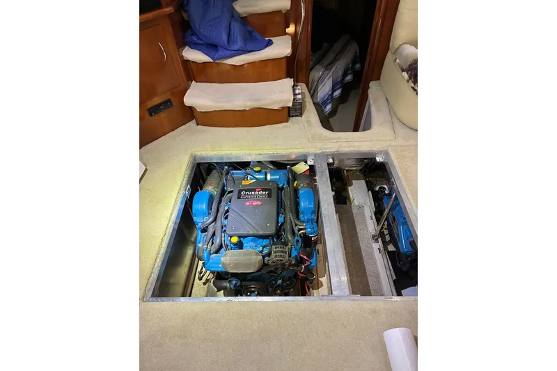 Slide: The Image of 2003 Carver 366 Motor Yacht engine compartment with Crusader engine visible. - 29
