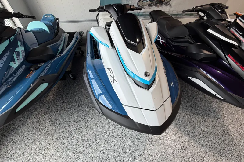 Slide: The Image of 2026 Yamaha WaveRunner FX HO in showroom, featuring sleek design and vibrant colors. - 2