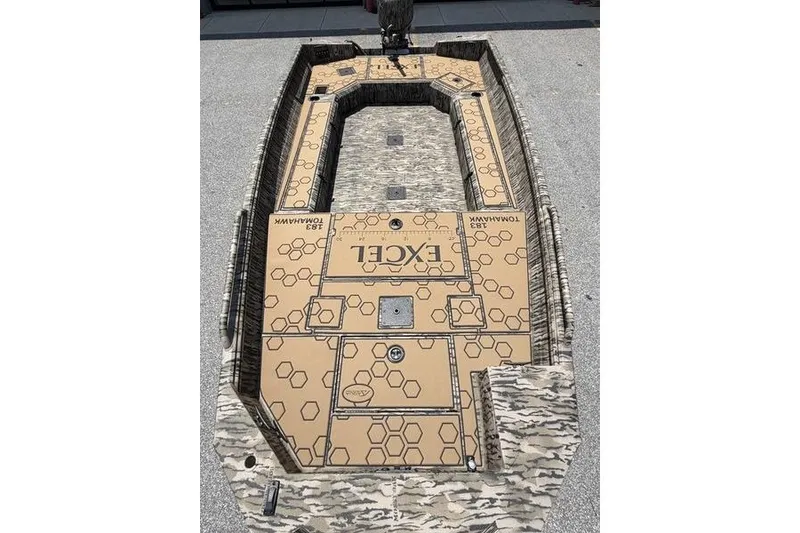 Slide: The Image of 2027 Excel 183 Tomahawk boat with camouflage design and hexagonal pattern flooring. - 17
