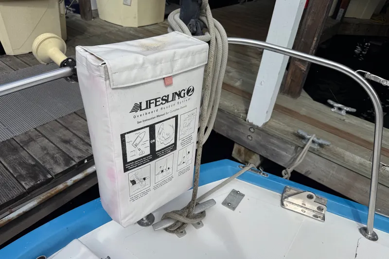 Slide: The Image of Lifesling overboard rescue system on a 1974 Spencer 53 sailboat deck. - 44