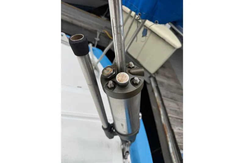Slide: The Image of Close-up of a Spencer 53 sailboat component, showcasing metal fittings and bolts, 1974 model. - 53