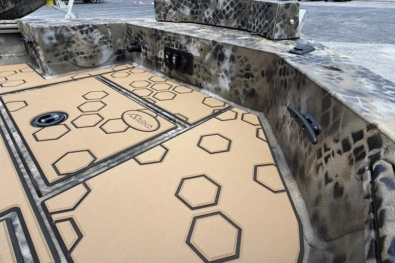 Slide: The Image of Interior of 2027 Excel 183 Tomahawk boat with hexagonal patterned flooring. - 22