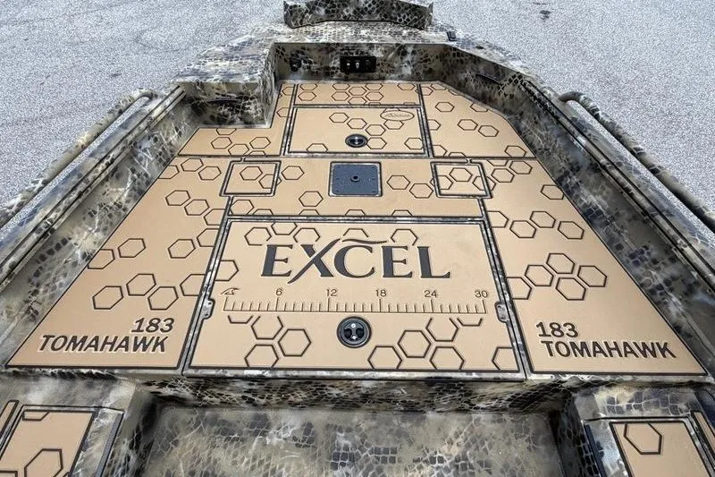 Slide: The Image of 2027 Excel 183 Tomahawk boat deck with hexagonal pattern and measurement markings. - 14