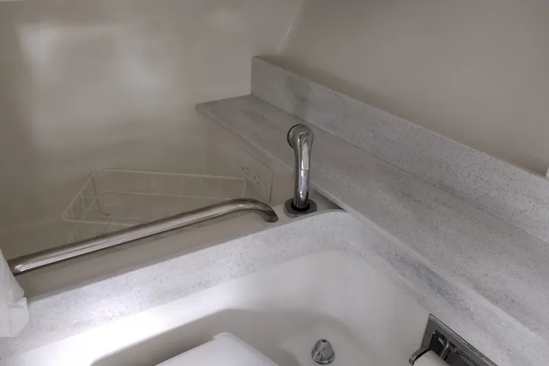 Slide: The Image of 2020 Formula 350 Crossover Bowrider bathroom sink with faucet and countertop. - 41