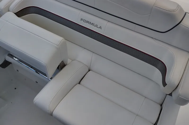 Slide: The Image of 2020 Formula 350 Crossover Bowrider interior seating, featuring luxurious white upholstery. - 68