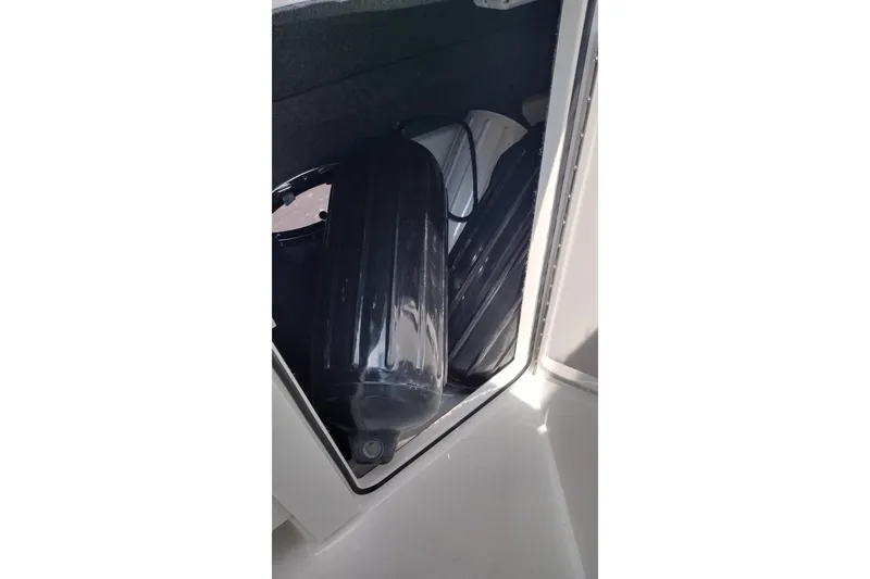 Slide: The Image of Storage compartment in a 2020 Formula 350 Crossover Bowrider boat. - 57