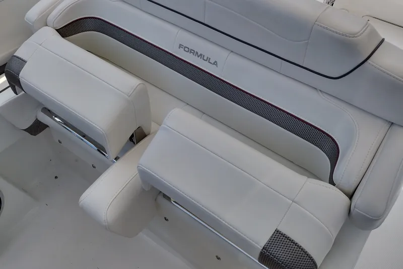 Slide: The Image of 2020 Formula 350 Crossover Bowrider interior seating with white upholstery and stylish design. - 69