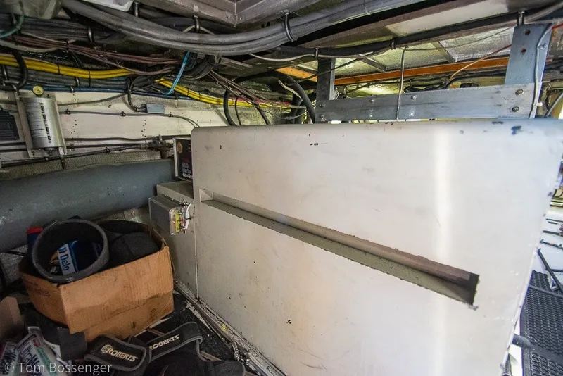 Slide: The Image of Engine room of 1987 Hatteras 52 Convertible with wiring and equipment. - 66