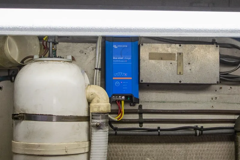 Slide: The Image of Engine room of 1987 Hatteras 52 Convertible with Victron Energy Blue Smart Charger. - 68