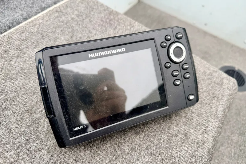 Slide: The Image of Humminbird Helix 5 fish finder on a 1994 Tracker Guide V-14 boat. - 27