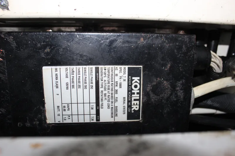 Slide: The Image of Kohler generator label on 1997 Silverton 351 Sedan, showing specifications and model details. - 73