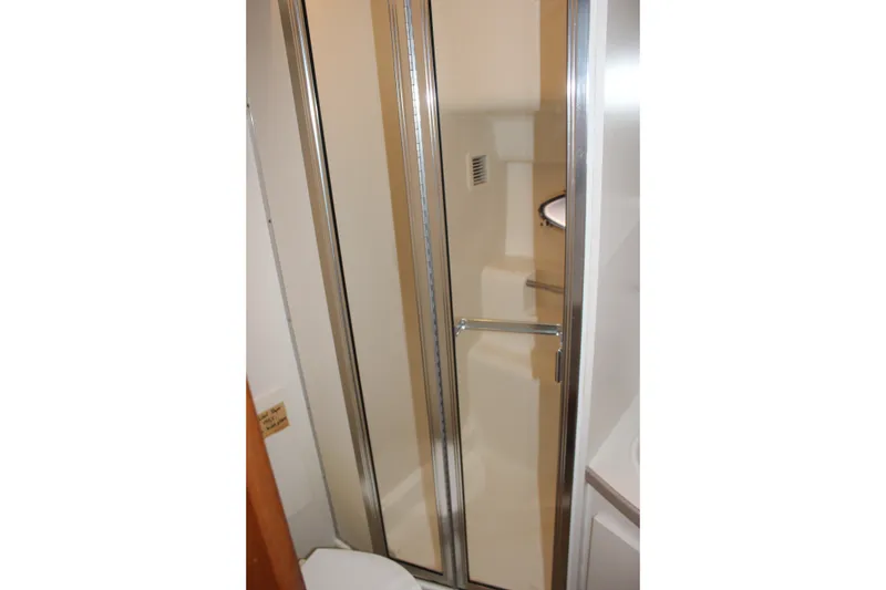 Slide: The Image of Shower area in 1997 Silverton 351 Sedan yacht bathroom. - 44