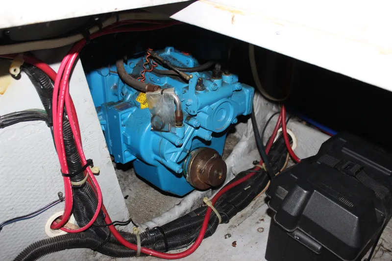Slide: The Image of Engine compartment of a 1997 Silverton 351 Sedan with visible wiring and components. - 71