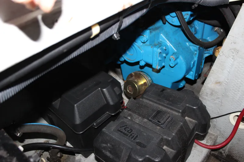 Slide: The Image of Engine compartment of a 1997 Silverton 351 Sedan with visible components and wiring. - 72