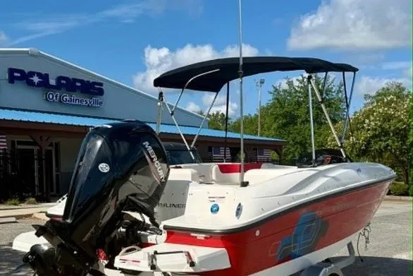 Slide: The Image of 2021 Bayliner Element E16 boat with Mercury engine, parked outside Polaris dealership. - 5