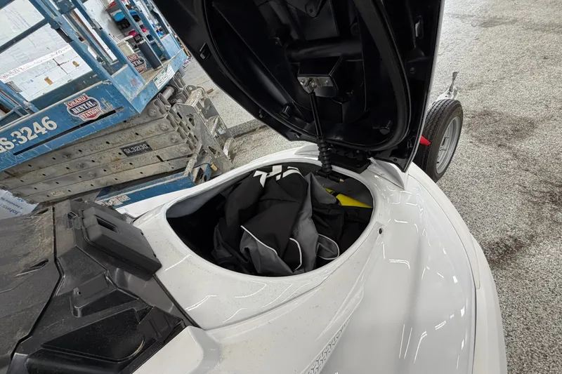 Slide: The Image of 2026 Yamaha WaveRunner FX Cruiser SVHO with open storage compartment, revealing interior contents. - 4