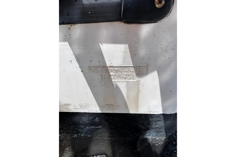Slide: The Image of Hull identification number on a 2001 Boston Whaler 23 Outrage boat. - 22