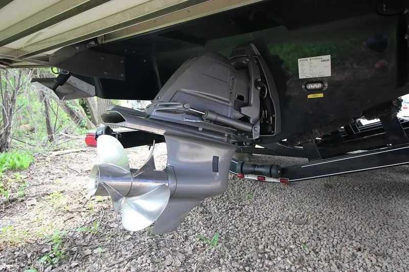 Slide: The Image of Close-up of a boat propeller and drive system on a 2016 Regal 2800 Bowrider. - 27