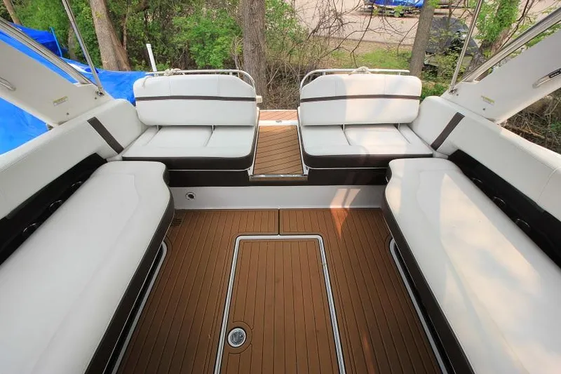 Slide: The Image of The image shows the cockpit of a 2016 Regal 2800 Bowrider with sleek white seating. - 11