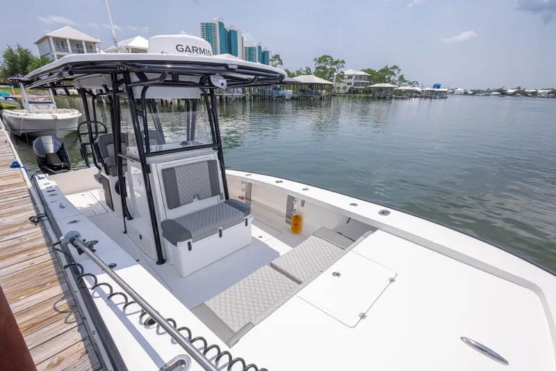 Slide: The Image of Modern Calcutta 263 boat docked by serene waterfront, showcasing sleek design and advanced features. - 73
