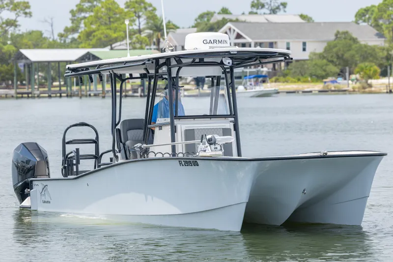Slide: The Image of 2026 Calcutta 263 boat on calm water with Garmin equipment. - 20