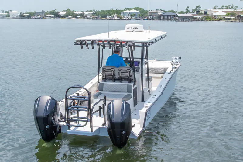 Slide: The Image of 2026 Calcutta 263 boat with dual engines on calm water. - 65