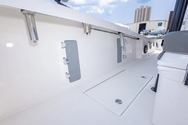Slide: The Image of 2026 Calcutta 263 boat interior with rod holders and storage compartments. - 45