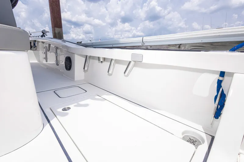 Slide: The Image of 2026 Calcutta 263 boat interior with sleek white deck and modern fittings. - 61