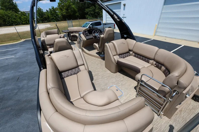 Slide: The Image of Luxurious interior of 2023 Bennington Q 25 QFBA pontoon boat with plush seating. - 7