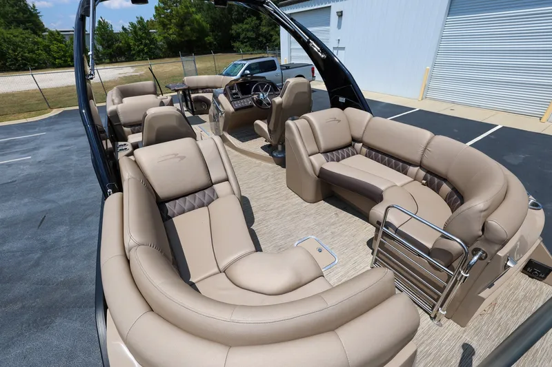 Slide: The Image of 2023 Bennington Q 25 QFBA pontoon boat with luxurious seating and modern design. - 6