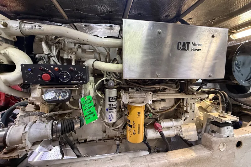 Slide: The Image of Engine room of 2002 Sea Ray 560 Sedan Bridge with CAT Marine Power engine. - 134