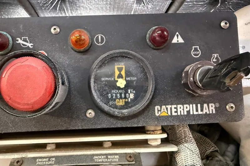 Slide: The Image of Caterpillar engine control panel on 2002 Sea Ray 560 Sedan Bridge yacht. - 126