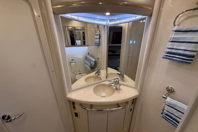 Slide: The Image of Luxurious bathroom interior of 2002 Sea Ray 560 Sedan Bridge yacht. - 90