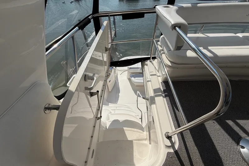 Slide: The Image of Staircase on 2002 Sea Ray 560 Sedan Bridge yacht with stainless steel railings. - 47
