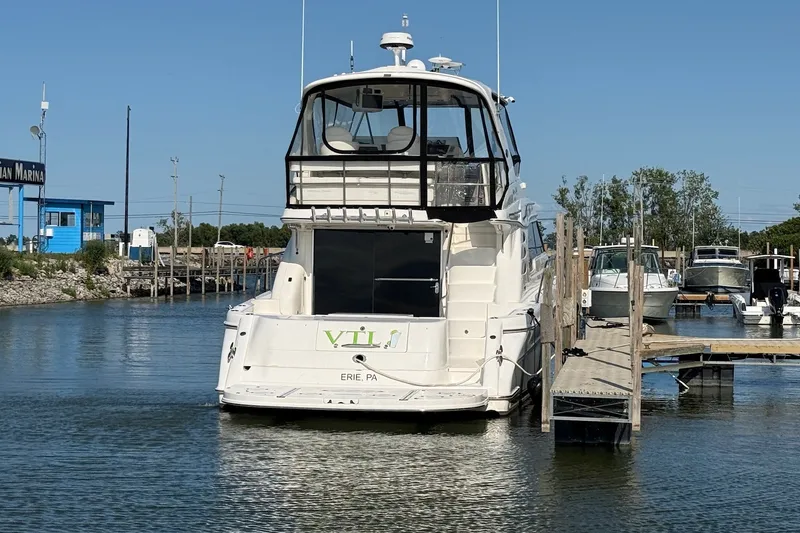 Slide: The Image of 2002 Sea Ray 560 Sedan Bridge yacht docked at marina, Erie, PA. - 4