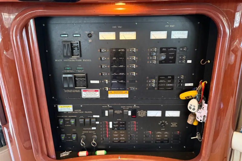 Slide: The Image of Electrical control panel on a 2002 Sea Ray 560 Sedan Bridge yacht. - 76