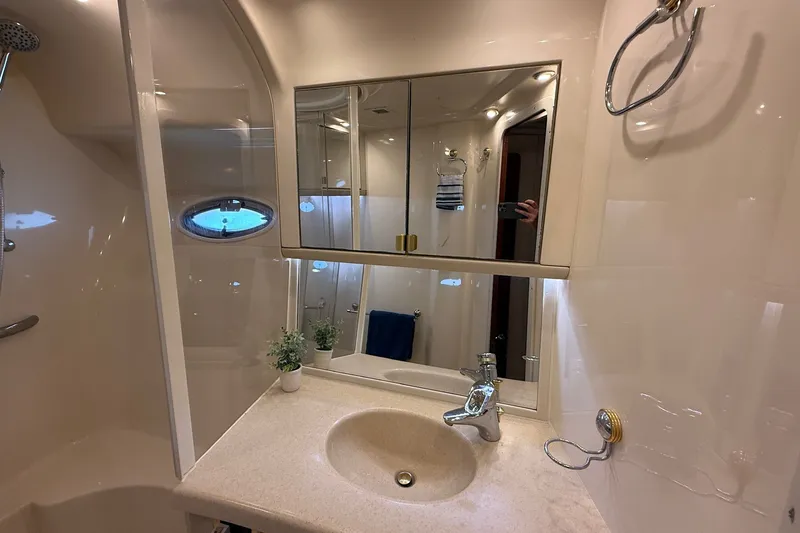 Slide: The Image of Luxurious bathroom interior of 2002 Sea Ray 560 Sedan Bridge yacht. - 102