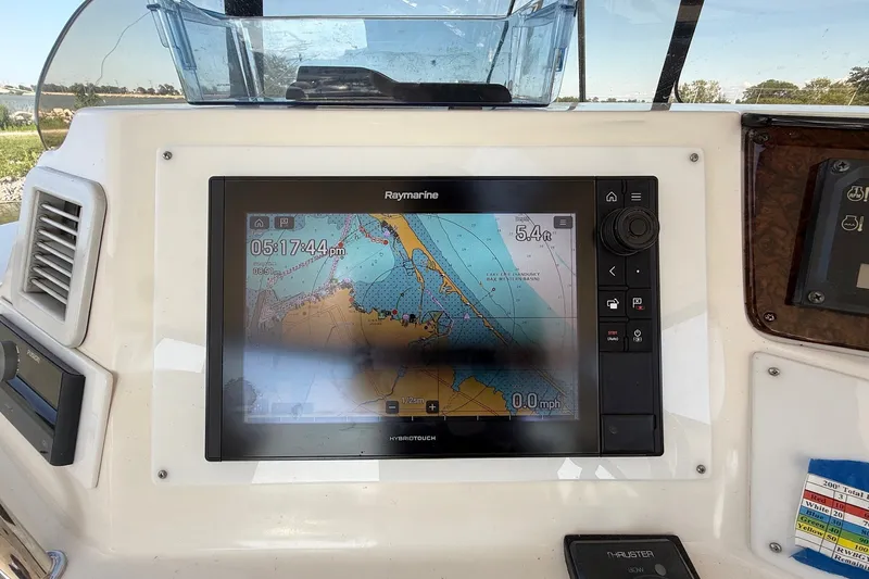 Slide: The Image of Raymarine navigation display on 2002 Sea Ray 560 Sedan Bridge yacht dashboard. - 38