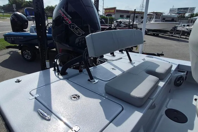 Slide: The Image of 2027 Blazer 675 Ultimate Bay boat with Mercury Pro XS engine, featuring cushioned seating. - 21