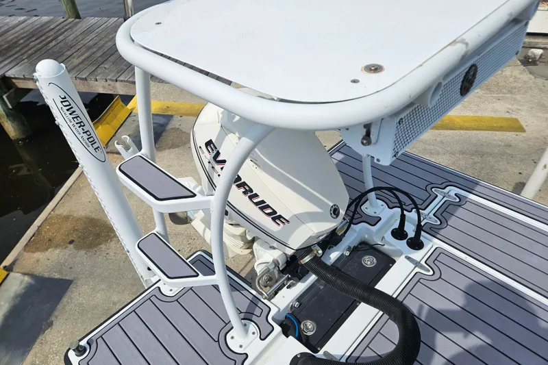 Slide: The Image of 2012 East Cape Fury boat with Evinrude motor and Power-Pole anchoring system at dock. - 17