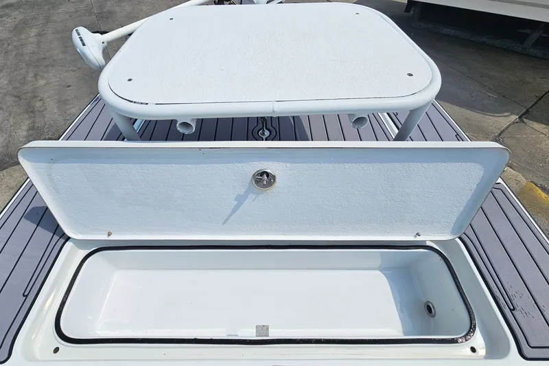 Slide: The Image of Open storage compartment on 2012 East Cape Fury boat deck. - 21