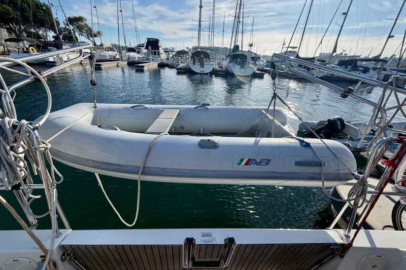 Slide: The Image of Inflatable dinghy on Jeanneau Sun Odyssey 349, 2019 model, docked at marina. - 19