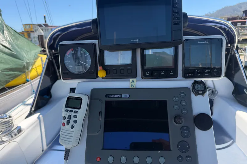Slide: The Image of Cockpit of 1996 Catalina 36 MkII sailboat with navigation instruments and controls. - 29