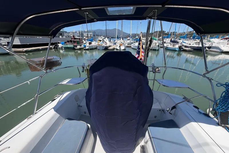 Slide: The Image of Cockpit view of a 1996 Catalina 36 MkII sailboat docked in a marina. - 27