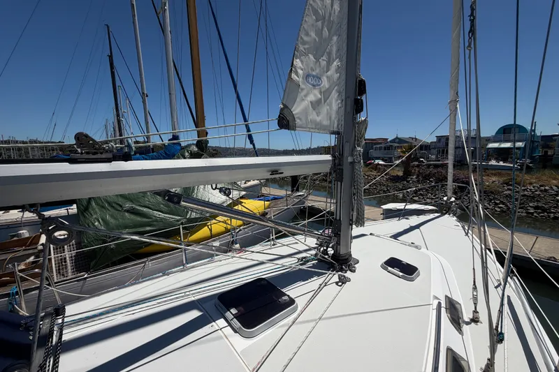 Slide: The Image of 1996 Catalina 36 MkII sailboat deck with rigging and marina view. - 13