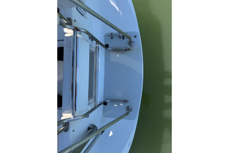 Slide: The Image of Top view of a 1996 Catalina 36 MkII boat's deck with metal railings. - 32