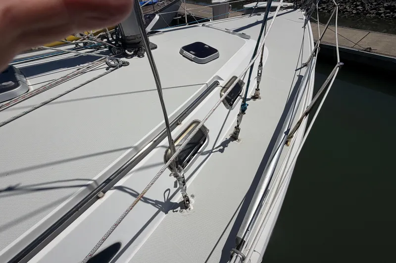 Slide: The Image of Deck view of a 1996 Catalina 36 MkII sailboat, showcasing rigging and fittings. - 14