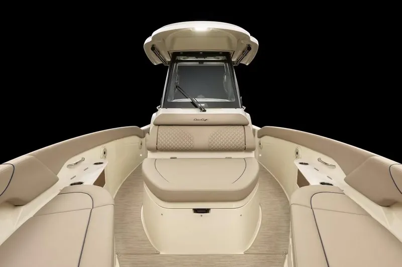 Slide: The Image of Manufacturer Provided Image: 2025 Chris-Craft Catalina 28 boat interior with beige seating and modern design. - 7