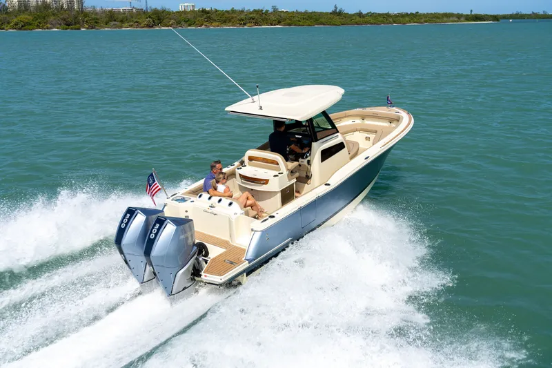 Slide: The Image of 2026 Chris-Craft Catalina 28 cruising on open water with dual engines. - 2